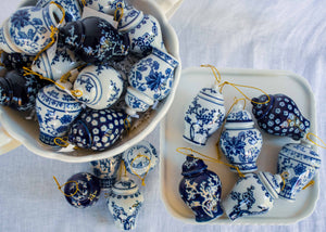 Set of six blue and white ginger jar ornaments, with a white compote.